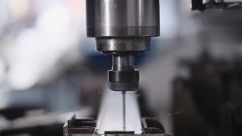 Automatic Drilling Machine with CNC Control The Process of Creating Holes in a Metal Workpiece in