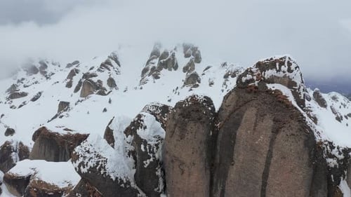 Winter Mountains Aerial View Under Cloudy Sky