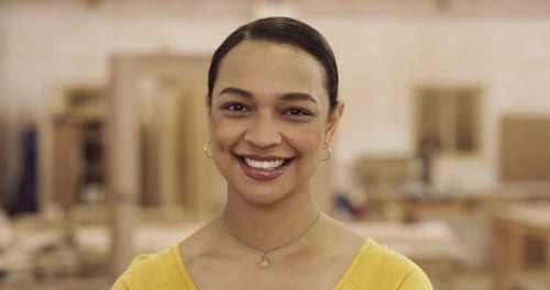 4k video footage of a young businesswoman working in her construction workshop