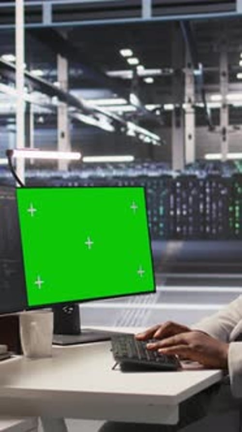 Vertical Video Data Center Programmer Coding on Green Screen PC Monitoring AI Systems