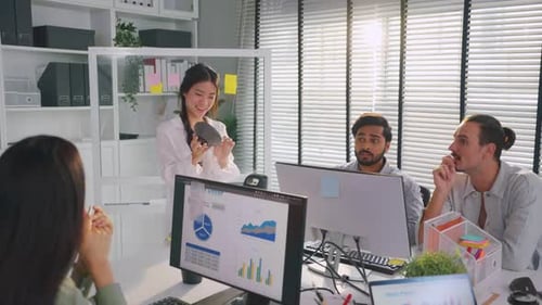 Group of young businessman and businesswoman working in the office.