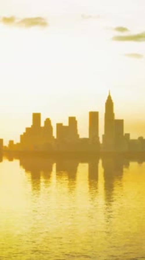 Beautiful Sun Ray Over Downtown During Hazy Sunrise