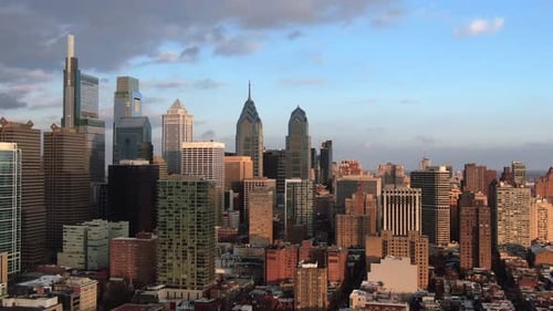 Modern cityscape with skyscrapers at sunset, aerial view of modern city with tall buildings, busines