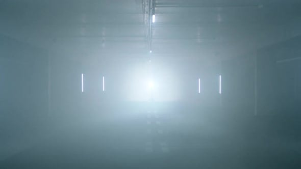 Mysterious interior with intense backlight and fog, creating an eerie ...