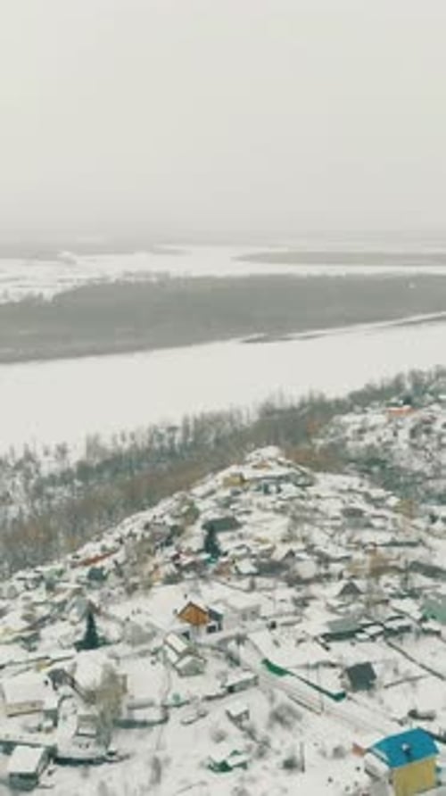 Winter Landscape with Town By Forest and River Aerial View