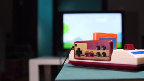Retro Gaming Console Connected to Television