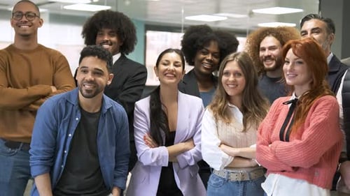 Contented Multiethnic Business Team Posing in Creative Office
