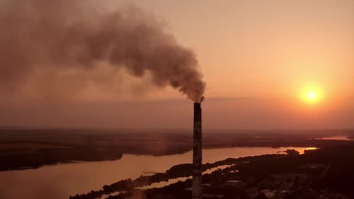 Power pylons on sunset time background. High voltage electric tower at the sunset. Fabric concept.