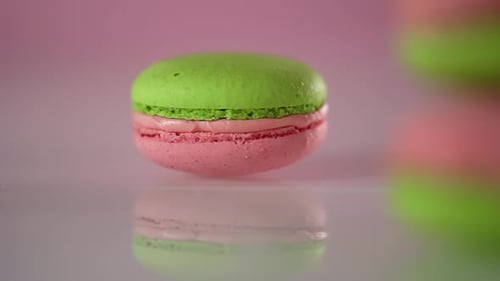 Close Up of Pink and Green Macaron Dessert