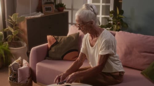 Senior Caucasian Woman Injecting Insulin after Testing Blood Sugar