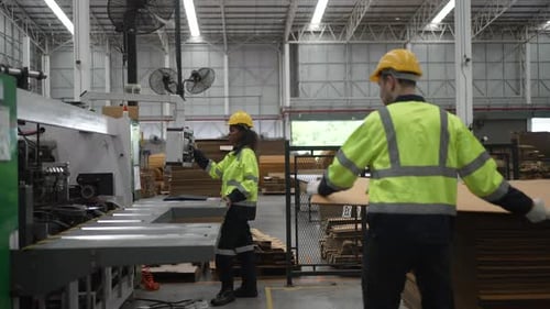 Blue collar worker and cardboard package factory.