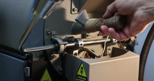 Coffee Beans Being Released From Roaster Machine