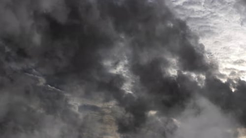Heavy Storm Clouds Gathering in the Daytime Sky