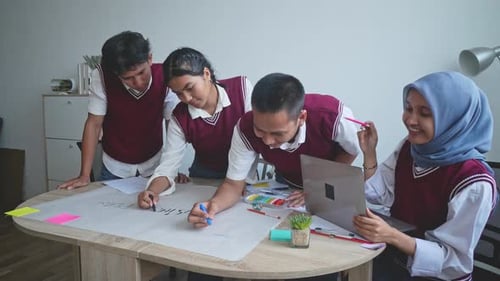 High School Students Doing School Work Together