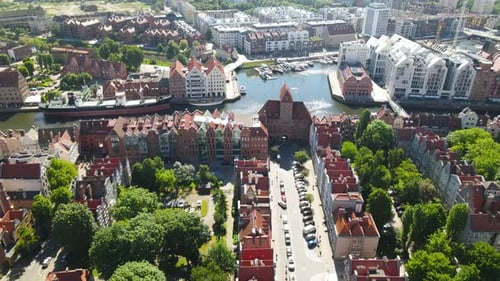 Pull out aerial over the historic old town of Gdansk Poland - New meets old architecture.