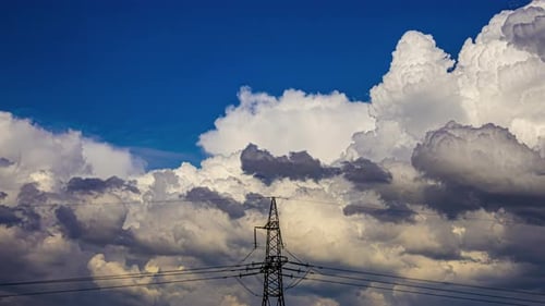 Cloudlapse timelapse with powerlines telegraph pylon