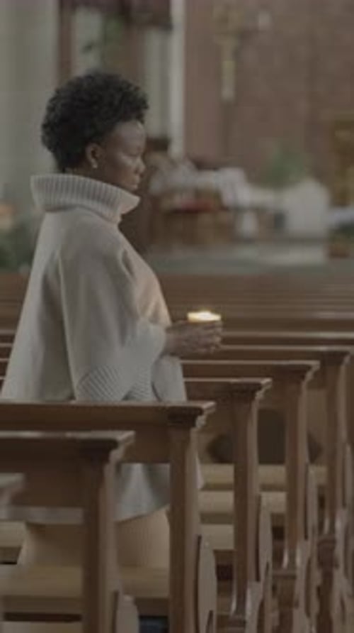 Contemplation in Quiet Reflection A Soulful Moment Within the Sacred Space of a Church