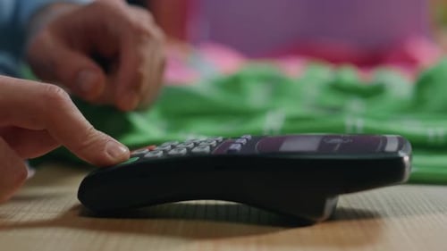 Salesman Hands Using Terminal Buttons at Store Cashier Closeup Customer Paying
