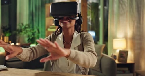 Woman Enjoys Virtual Reality at Home at Night