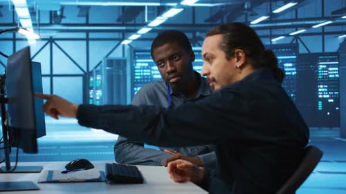 Diverse Coworkers Supervising Data Center Supercomputers