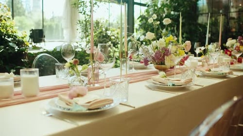 Elegant Table Setting with Floral Centerpiece for Wedding