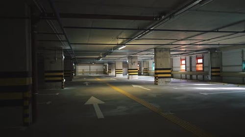 Empty Modern Parking Garage with Painted Arrows