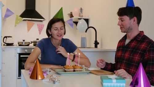 Couple Celebrating Birthday at Home
