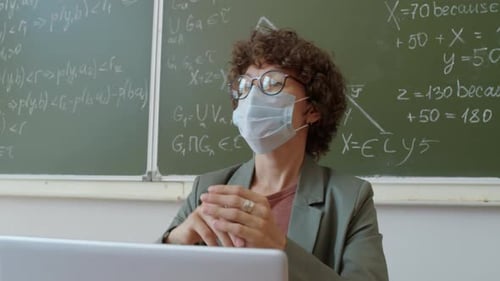 Teacher Explains Math Concept Via Laptop