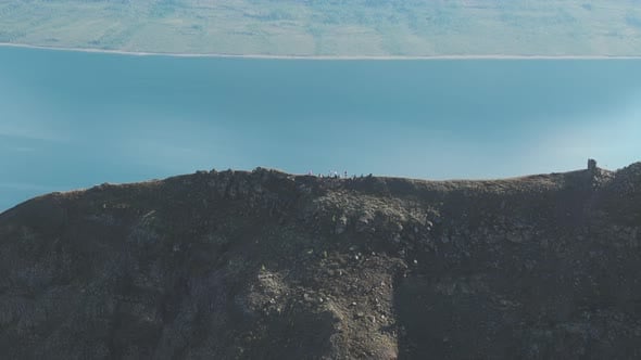 Aerial View of Hikers on Skyline Ridge Above Lake Lama in the Putorana ...