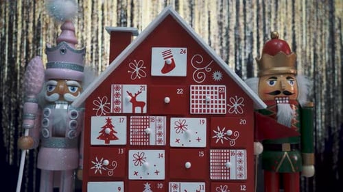 Wooden Tree Advent Calendar Decorated and Nutcracker Soldier Toys With Bokeh Blured BackgrWooden Tre