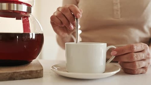 Girl Preparation Tea Cup