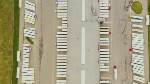 Aerial Drone Footage of Busy Logistics Hub and Distribution Center