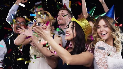 Friends party, confetti and dancing with energy, birthday celebration and new year with music