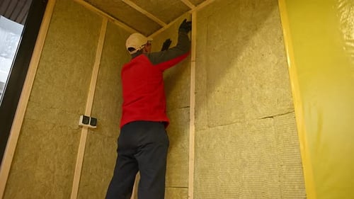 Installing Mineral Wool Insulation in a Wall