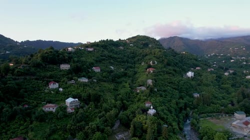 Aerial View on Village in Mountains Near to Sea