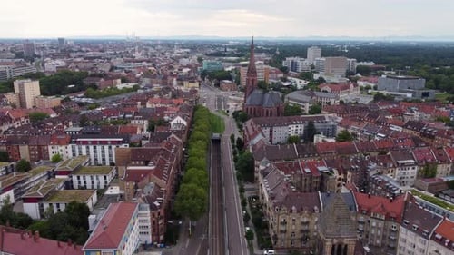 Drone aerial footage of Karlsruhe CItyscape in Germany. Shot at golden hour of a tranquil summer sun