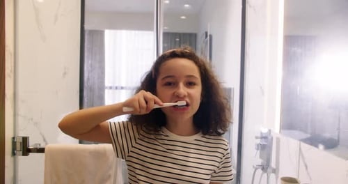 Children Daily Healthcare Routine Cute Caucasian Child with White Tooth Looking at Mirror Isolated