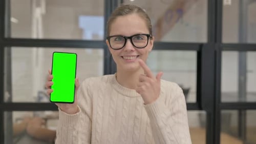 Woman Showing Phone with Green Screen