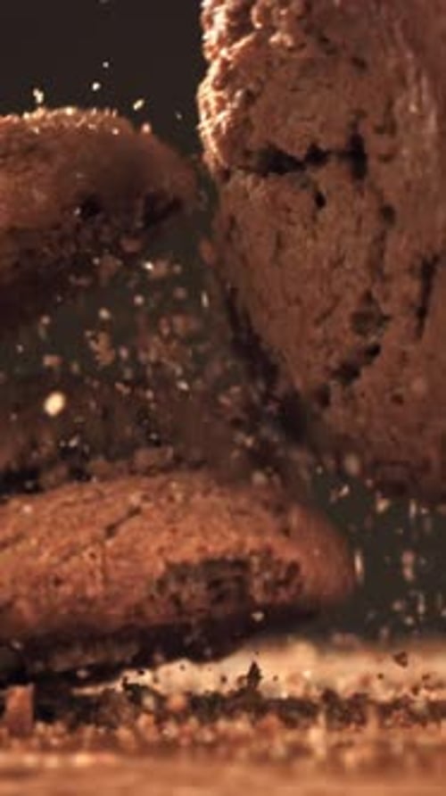 Oatmeal Cookies Fall on a Wooden Board Filmed on a Highspeed Camera at 1000 Fps