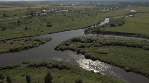 Top View of Beautiful River Turns on Background of Green Fields Stock Footage Summer Panorama of