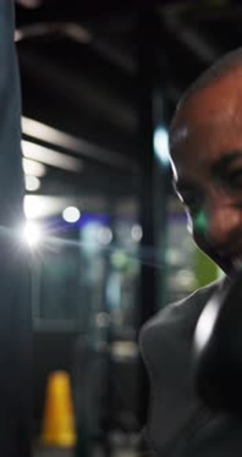 Boxing, athlete and man in gym with punching bag, practice and training for fighting competition