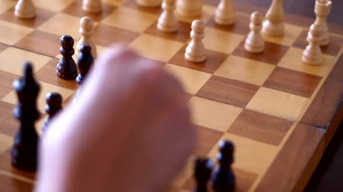 Yuriy Chess pieces moving black piece. Chess board from hard strategy logic game.