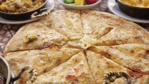 Turkish and Arabic Traditional Baked Pita with Butter Cheese and Spicy Herbs