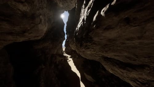 A Narrow Passage Between Two Rocks in a Cave