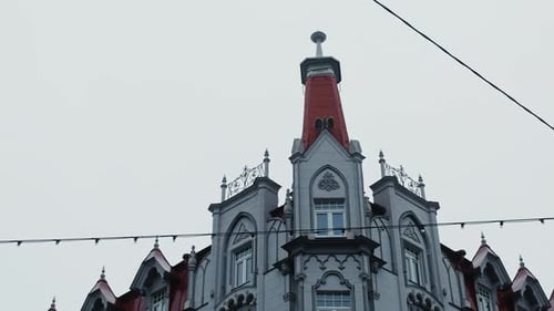 The Elegant Architectural Details of a Beautiful Historic Building Stand Tall Against a Gloomy