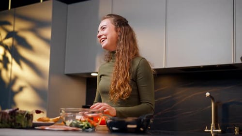 Close Up Young Couple in Love in a Beautiful Kitchen Preparing Dinner Together Happy Relationship