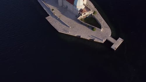 Aerial view of Church, Island, Building, Sea, and Bay at Kotor Bay, Montenegro.