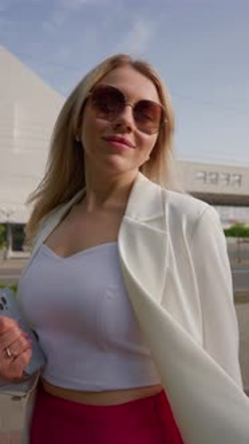 Stylish Woman Walking in an Urban Setting