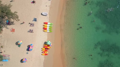 People Relaxing on Tropical Beach on Phuket Island in Thailand