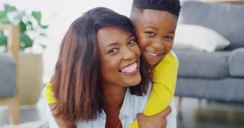 Mother and Son Embrace Indoors